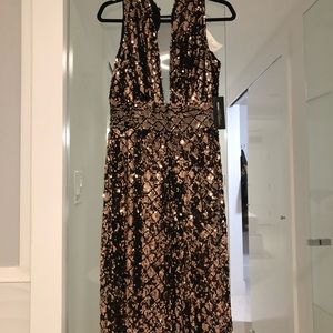 New gold sequins jumpsuit with tag